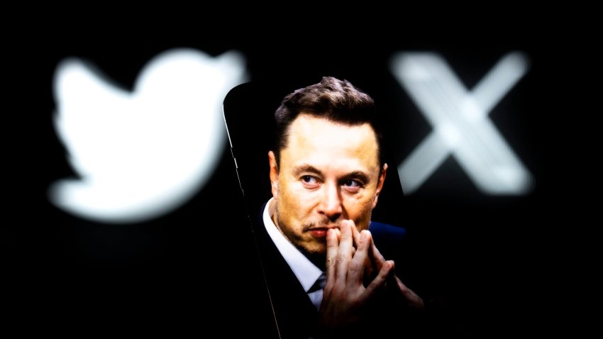 An effigy of Elon Musk is seen on a mobile device with the X and Twitter logos in the background in this photo illustration on 23 July, 2023 in Warsaw, Poland. 