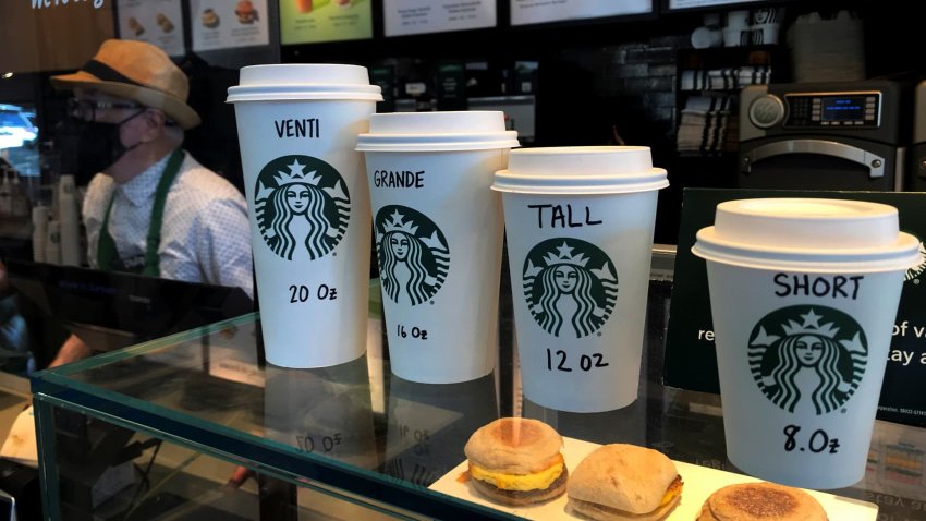 Starbucks cups are pictured on a counter in Manhattan, New York, on Feb. 16, 2022.