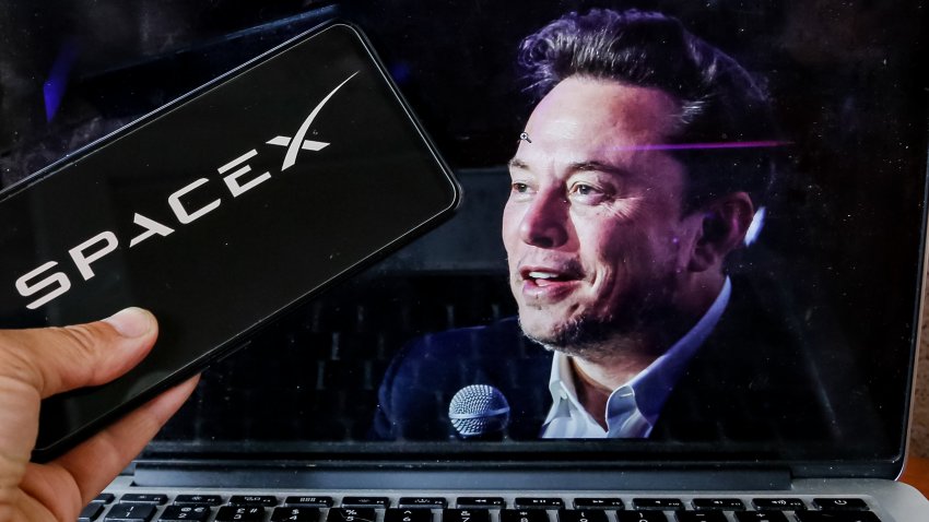 In this photo illustration, the SpaceX logo is seen displayed on a smartphone screen and a computer screen displaying a portrait of Elon Musk on June 10, 2024. SpaceX is accused of not giving enough attention to environmental issues during its space programmes. (Photo by Dominika Zarzycka/NurPhoto via Getty Images)